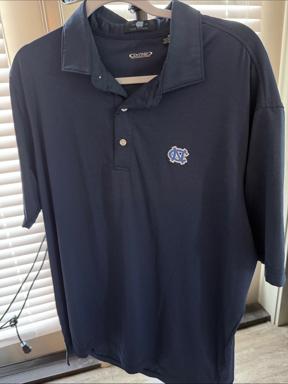 Finley Men’s Navy Polo with UNC Embroidered Logo